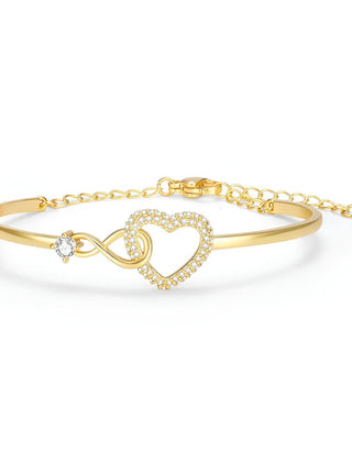 Mother daughter bracelet in yellow gold tone, a slim bangle closing through an open pave-set heart