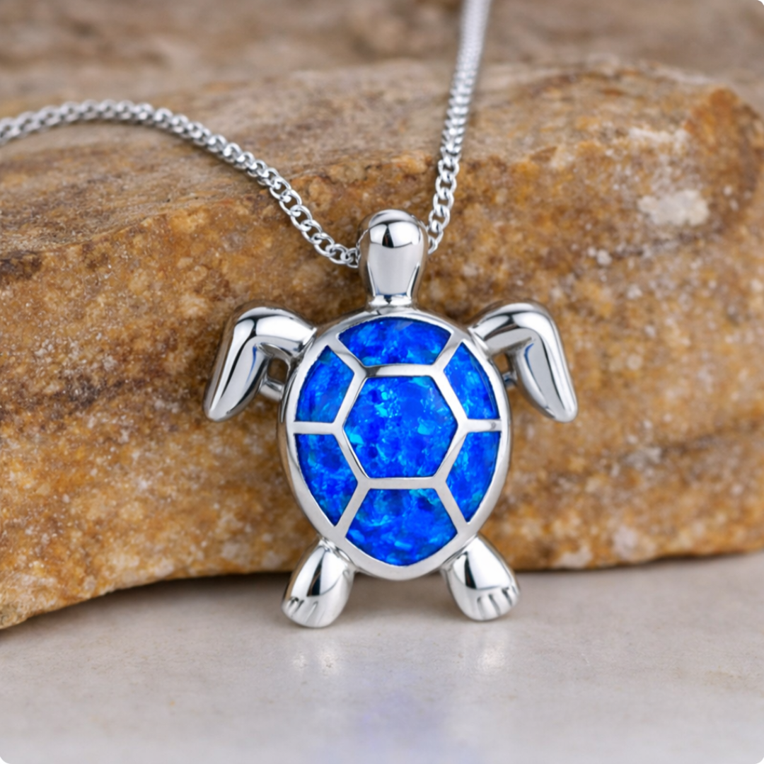 Opal turtle pendant necklace with a blue shell on a fine chain