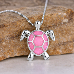 Opal turtle pendant necklace with a pink shell