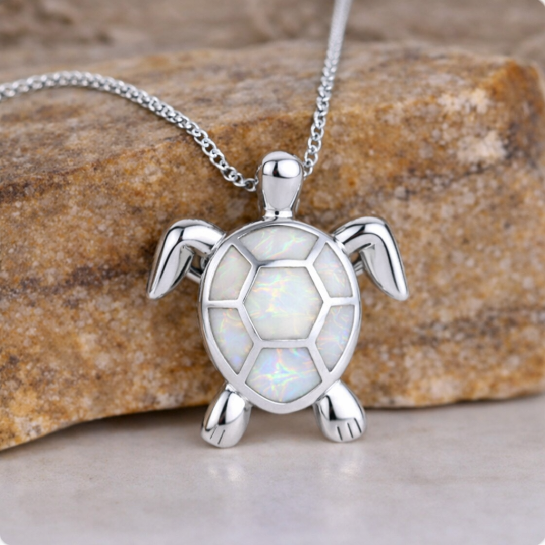 Opal turtle pendant necklace with a white shell