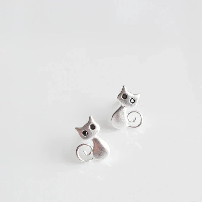 Pair of small silver-tone cat stud earrings, each a sitting cat with a curled tail