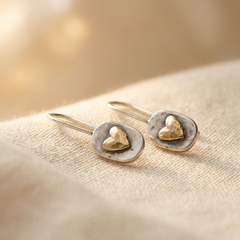 Small polished two-tone dome drop earrings on a fine hook