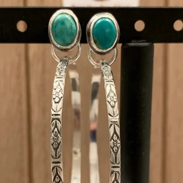 The same stamped hoop earrings with green-teal oval stones